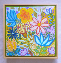 Load image into Gallery viewer, A square framed painting featuring a colorful, whimsical floral design with blue, yellow, pink, purple, and green flowers on a light background, housed in a light wood frame.