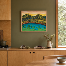 Load image into Gallery viewer, A framed landscape painting by New Zealand artist Miranda J Caird on an olive green wall in a modern apartment