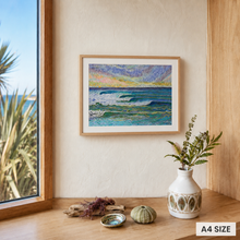 Load image into Gallery viewer, Pumping art print – A4 size – shown in coastal living room interior with linen armchair and ocean view